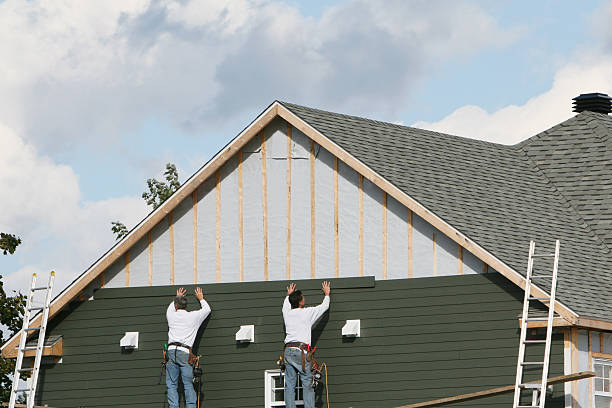 Professional Siding technician working in Tall Timbers, MD